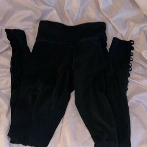 black leggings with pattern at the ends (worn a few times)